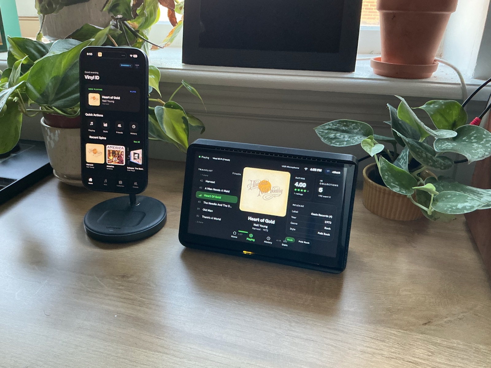 Vinyl ID on a desk next to the iOS companion app